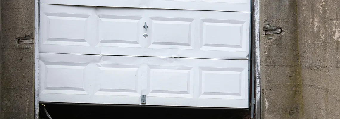 Garage Door Got Hit By A Car Dent Removal in Oakville, ON