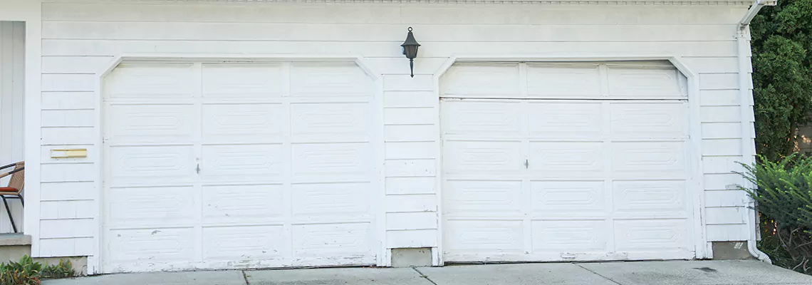 Roller Garage Door Dropped Down Replacement in Oakville, ON