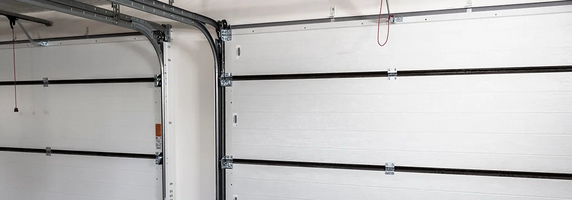 Fix Folding Garage Door Jerking in Oakville, Ontario